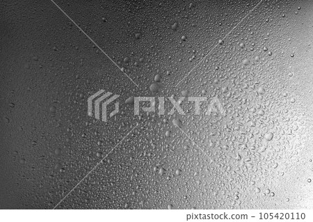 Water drops on gray metal background texture with smooth transition of lighting Water drops on gray metal background texture with smooth transition of lighting 105420110