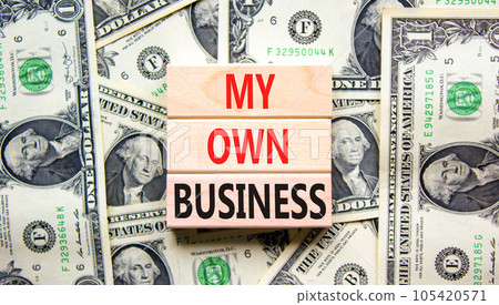 My own business symbol. Concept words My own business on wooden block. Dollar bills. Beautiful background from dollar bills. Business motivational my own business concept. Copy space. My own business symbol. Concept words My own business on wooden block. Dollar bills. Beautiful background from dollar bills. Business motivational my own business concept. Copy space. 105420571