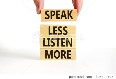 Speak less listen more symbol. Concept words Speak less listen more on wooden block. Beautiful white table white background. Motivational business speak less listen more concept. Copy space. 105420597