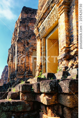 High-definition photograph showcasing the intricate brick and laterite masonry of the ancient Khmer temple, Pre Rup. 105420730
