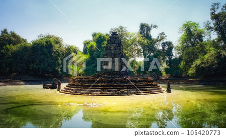 Jayatataka monument, a former Hindu royal temple now associated with Buddhist symbols, situated on an island in the center of baray, recreating the sacred Himalayan lake Anavatapta. 105420773