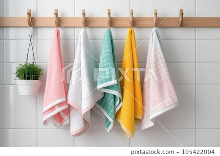 Kitchen towels haning on steel rack. Wall textile. Generate AI 105422004