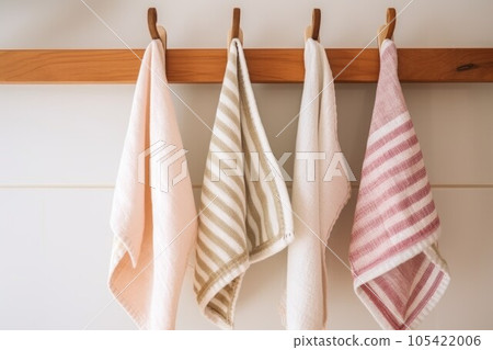Kitchen striped towels haning on rack. Cleaning cotton. Generate AI 105422006