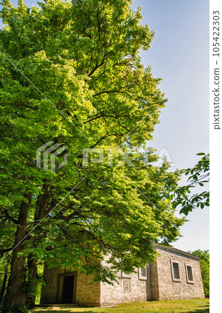 Old rural church in front of Khotyn Fortress. Braga, Ukraine. Old rural church in front of Khotyn Fortress. Braga, Ukraine. 105422303