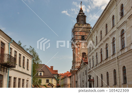 Narrow street with Church of St. Nicholas in Kamianets-Podilskyi, Ukraine. Narrow street with Church of St. Nicholas in Kamianets-Podilskyi, Ukraine. 105422309