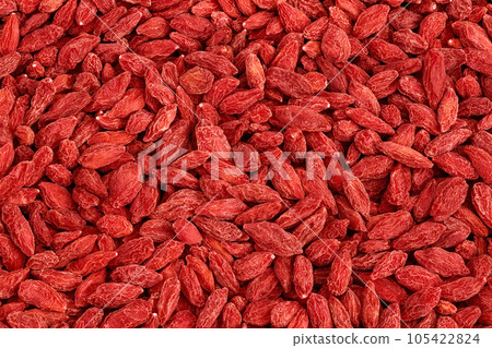 Dried goji berries as a background. Top view. Flat lay. Dried goji berries as a background. Top view. Flat lay. 105422824