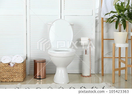 Stylish toilet bowl in modern bathroom interior 105423363