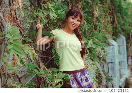 beautiful girl in the branches of vines 105425121