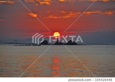 The sun rising from the sea The sun rising from the sea 105426446