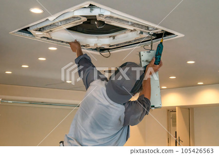 Ceiling and commercial air conditioner repair work Ceiling and commercial air conditioner repair work 105426563