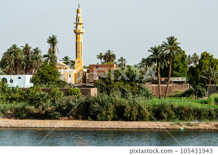 Panoramic view of fertile banks of Nile and everyday life during river cruise River near Luxor Egypt direction assuan 105431943