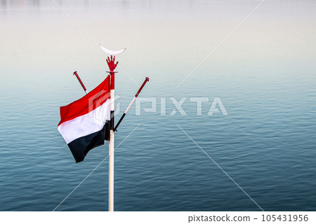 Egyptian flag fluttering on a cruise at the Nile river, Egypt Egyptian flag fluttering on a cruise at the Nile river, Egypt 105431956