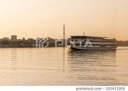 Panoramic view of fertile banks of Nile and everyday life during river cruise River near Luxor Egypt direction assuan Panoramic view of fertile banks of Nile and everyday life during river cruise River near Luxor Egypt direction assuan 105431958