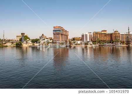 Luxor, Egypt city seaflont hotels buildings Nile river bank 105431970