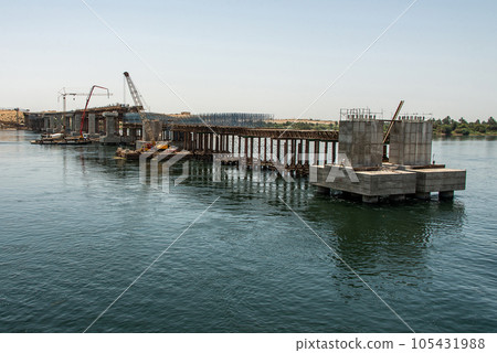 Build of new Nile river Bridge after Luxor in direction Assuan during boat cruise construction site Build of new Nile river Bridge after Luxor in direction Assuan during boat cruise construction site 105431988