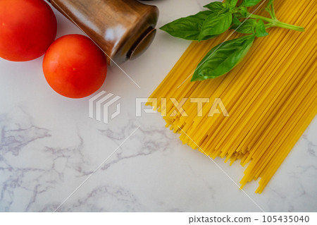 Pasta noodles spaghetti white background tableware overhead shooting material 105435040