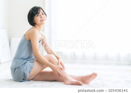 A young woman doing skin care A young woman doing skin care 105436141