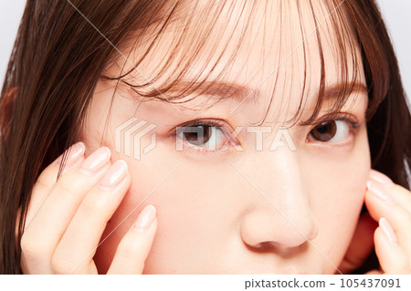 Beauty young Japanese woman eyes close-up Beauty young Japanese woman eyes close-up 105437091