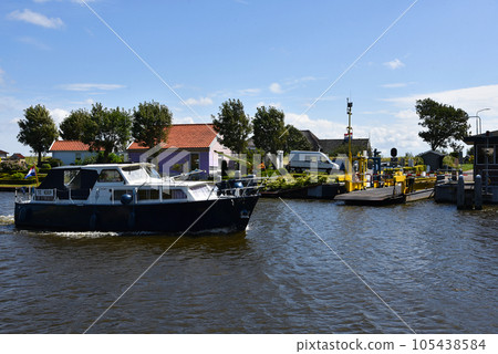Den Helder, Netherlands. July 23, 2023. The ferry across the North Holland Canal at Stolperbrug 105438584