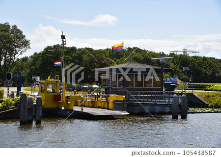 Den Helder, Netherlands. July 23, 2023. The ferry across the North Holland Canal at Stolperbrug 105438587