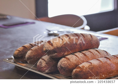 A pile of homemade spelled bread A pile of homemade spelled bread 105438657