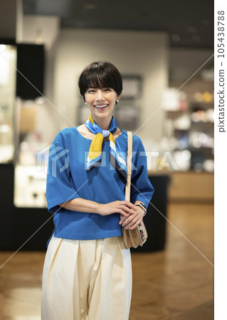 Woman in her early 30's shopping/outing image portrait Woman in her early 30's shopping/outing image portrait 105438788