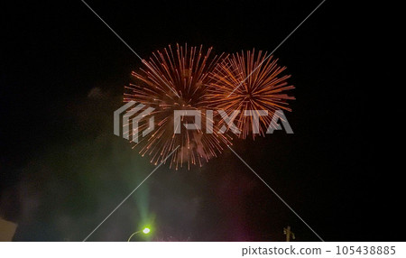 Fireworks blooming in the summer night sky Fireworks blooming in the summer night sky 105438885