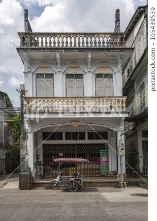 Authentic architecture of Thailand. Sino-Portuguese style building in the old town of Takua Pa Thailand, Phang Nga March 2, 2023 Authentic architecture of Thailand. Sino-Portuguese style building in the old town of Takua Pa Thailand, Phang Nga March 2, 2023 105439539