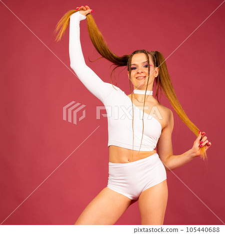 Photo of happy good mood smiling cheerful sportive athlete woman isolated on color background Photo of happy good mood smiling cheerful sportive athlete woman isolated on color background 105440688