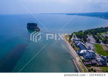 Drone | Summer sky and Noto tourist attraction Mitsukejima (also known as Gunkanjima) from the sea | Suzu City, Ishikawa Prefecture Drone | Summer sky and Noto tourist attraction Mitsukejima (also known as Gunkanjima) from the sea | Suzu City, Ishikawa Prefecture 105440819