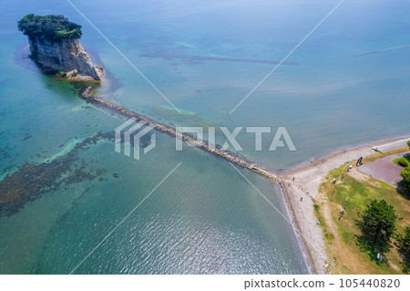Drone | Aerial view of Noto's tourist attraction Mitsukejima (also known as Gunkanjima) from the sea | Suzu City, Ishikawa Prefecture Drone | Aerial view of Noto's tourist attraction Mitsukejima (also known as Gunkanjima) from the sea | Suzu City, Ishikawa Prefecture 105440820