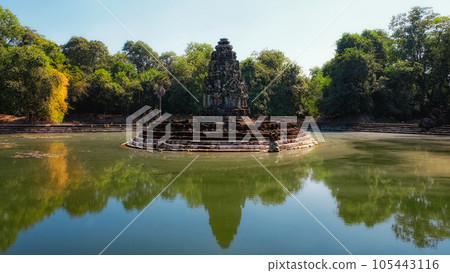 Jayatataka monument, a historic Hindu royal temple now associated with Buddhist symbols, situated on an island in baray, mimicking the sacred Himalayan lake Anavatapta. 105443116