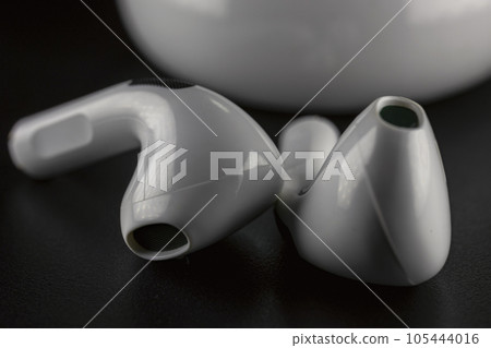 small white headphones small white headphones 105444016