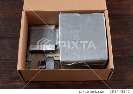 Mail bomb. Improvised Explosive Device with plastic explosive C-4 and cell phone module in package Mail bomb. Improvised Explosive Device with plastic explosive C-4 and cell phone module in package 105445842