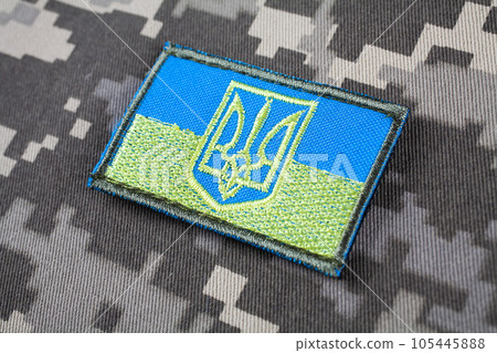 KYIV, UKRAINE - October 5, 2022. Russian invasion in Ukraine 2022. Ukraine Army Flag Patch uniform shoulder sleeve insignia badge. KYIV, UKRAINE - October 5, 2022. Russian invasion in Ukraine 2022. Ukraine Army Flag Patch uniform shoulder sleeve insignia badge. 105445888