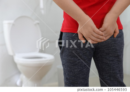 Boy suffering from hemorrhoid in rest room, closeup Boy suffering from hemorrhoid in rest room, closeup 105446593
