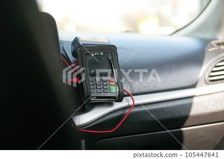 POS machine on yellow taxi  105447641
