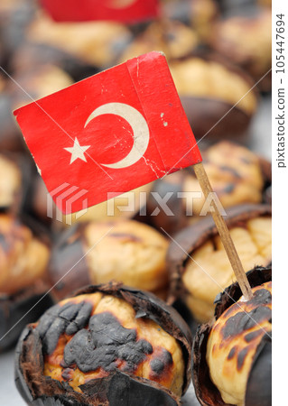 traditional Istanbul street food grilled chestnuts in a row traditional Istanbul street food grilled chestnuts in a row 105447694