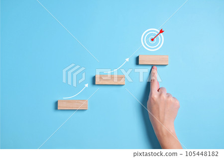 success target background. step of success target to the arrow board. arrow hit on middle board . target and success symbol. High quality photo 105448182