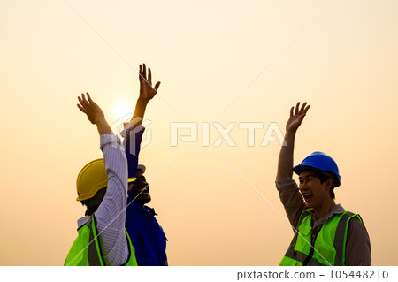 Engineers checking solar panels on solar power plant Engineers checking solar panels on solar power plant 105448210