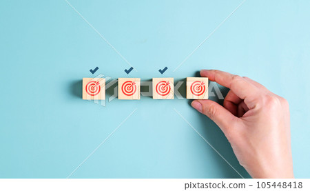 Target icon. Goal symbol. Arrow hit the middle point of dartboard. hight quality photo Target icon. Goal symbol. Arrow hit the middle point of dartboard. hight quality photo 105448418