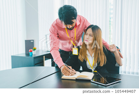 Boss or supervisor touching female employee's shoulder Causing young employees to resist because they are uncomfortable and afraid of being sexually abused. Concept of sexual harassment in the Boss or supervisor touching female employee's shoulder Causing young employees to resist because they are uncomfortable and afraid of being sexually abused. Concept of sexual harassment in the 105449407