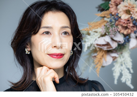 Portrait of a middle-aged woman Portrait of a middle-aged woman 105450432