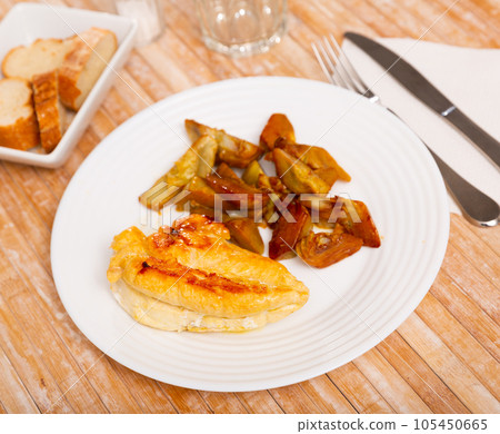 Grilled chicken breast with artichokes, healthy dinner Grilled chicken breast with artichokes, healthy dinner 105450665