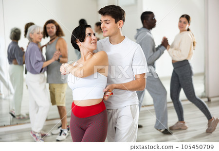Dancing positive couples learning salsa 105450709