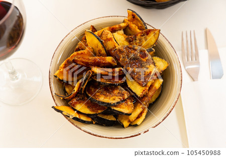 Plate with prepared food eggplants with honey Plate with prepared food eggplants with honey 105450988