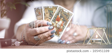 Concept of psychic advisor or ways of divination with cards. Concept of psychic advisor or ways of divination with cards. 105451109