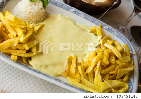 Veal steak with cream sauce Veal steak with cream sauce 105451143