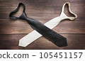 two ties, white and black, crossed like swords. Struggle concept 105451157