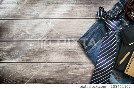 Men's necktie on Brown wooden background. Boss day, valentine's day 105451162
